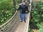 Young man on bridge